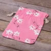 Säckchen à la Leinen mit Druck 18 x 24 cm - naturfarbe / rosa Blüten Auf Reisen