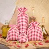 Säckchen à la Leinen mit Druck 10 x 13 cm - naturfarbe / rotes Gitter Für Haustiere